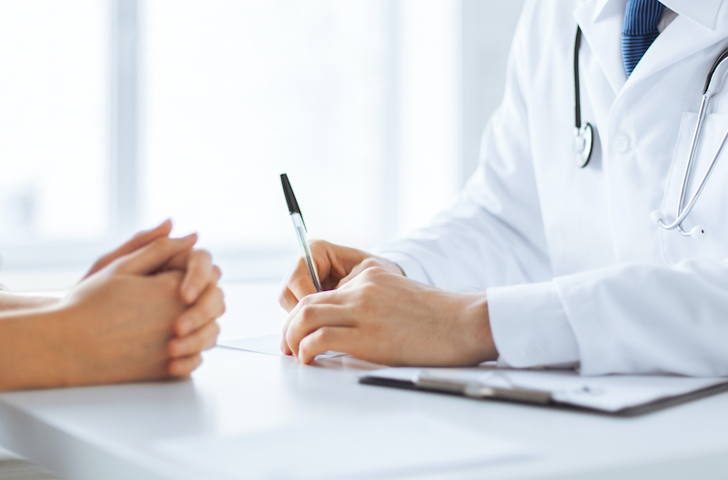 Doctor and patient communicating