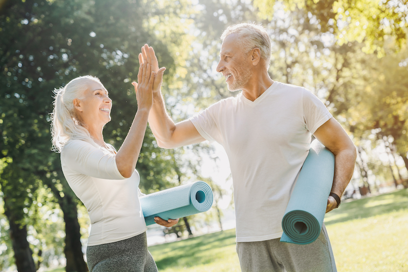 Senior couple supporting their workout